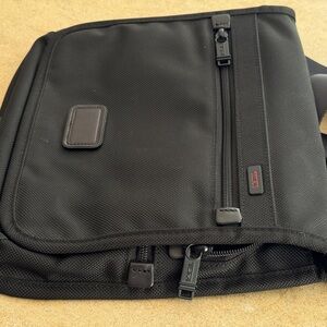 EUC Tumi black nylon messenger bag